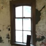 Interior wall showing rough masonry before window installation at Nelson Sanford House.